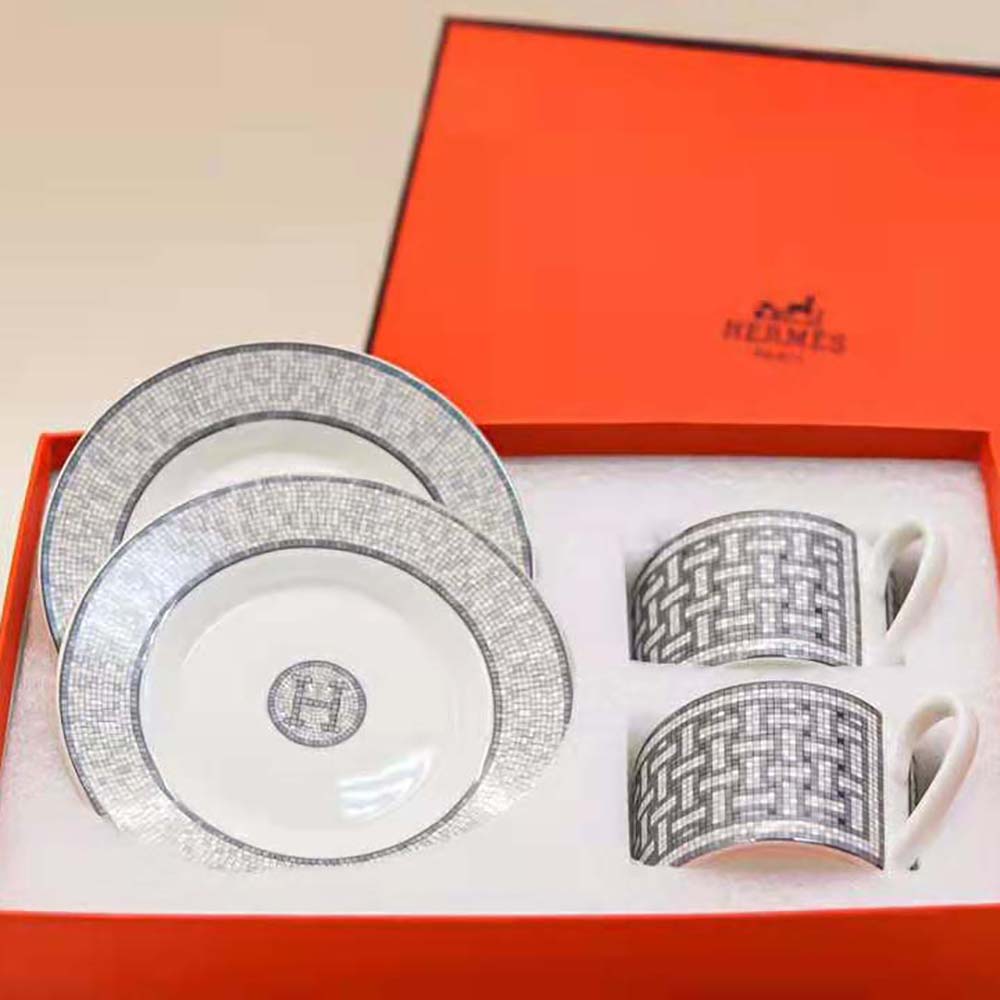 Close-up of platinum trim on Hermes Mosaique Au 24 tea cup and saucer