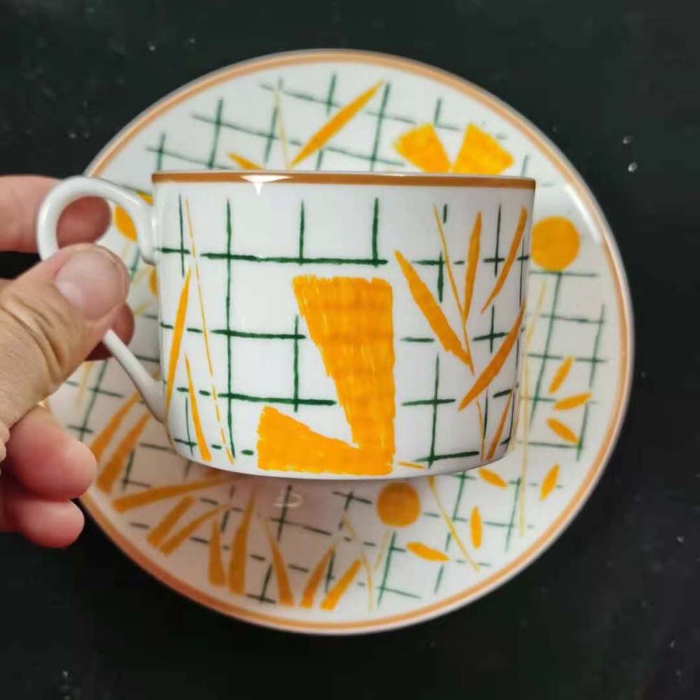 Top-down view of Hermes Unisex A Walk in the Garden Tea Cup and Saucer