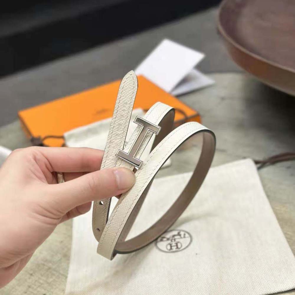 Side angle showing slim 13 mm width and signature Hermes engraving on buckle