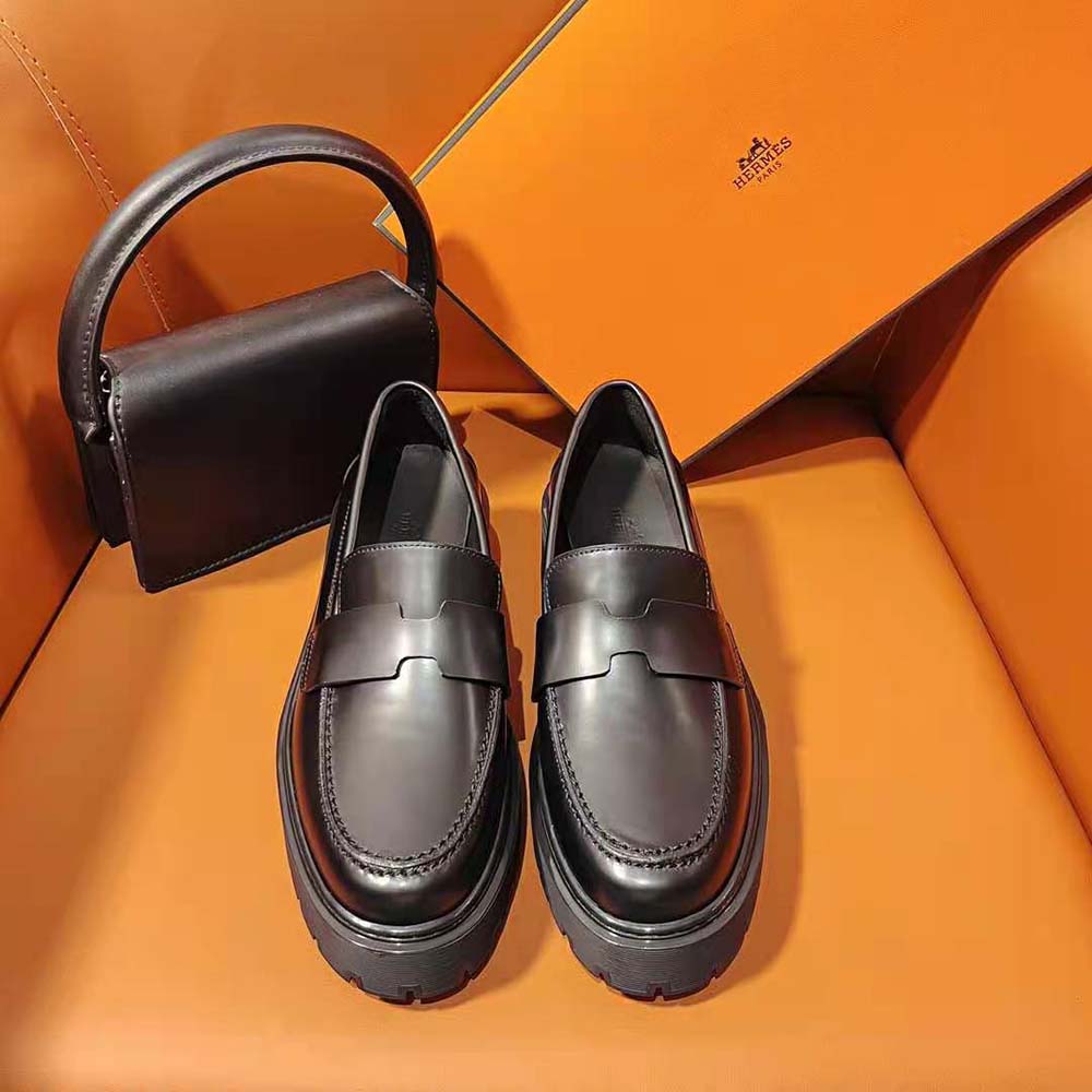 Close-up of Hermes silver hardware on Women Hitch Loafer black leather