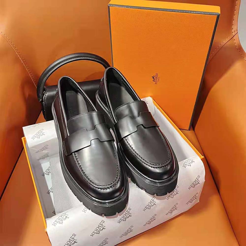 Top view of Hermes Women Hitch Loafer showcasing sleek black silhouette