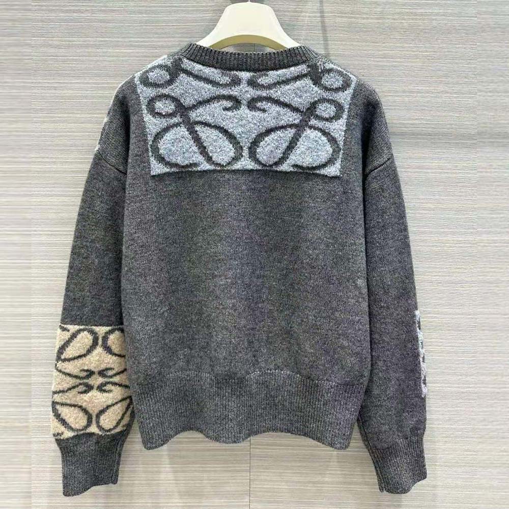 Side profile showing fit and ribbed hem of Loewe Men Sweater