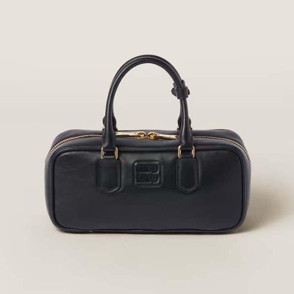 Front angle view of Miu Miu Women Arcadie Leather Bag-Black showing flap closure
