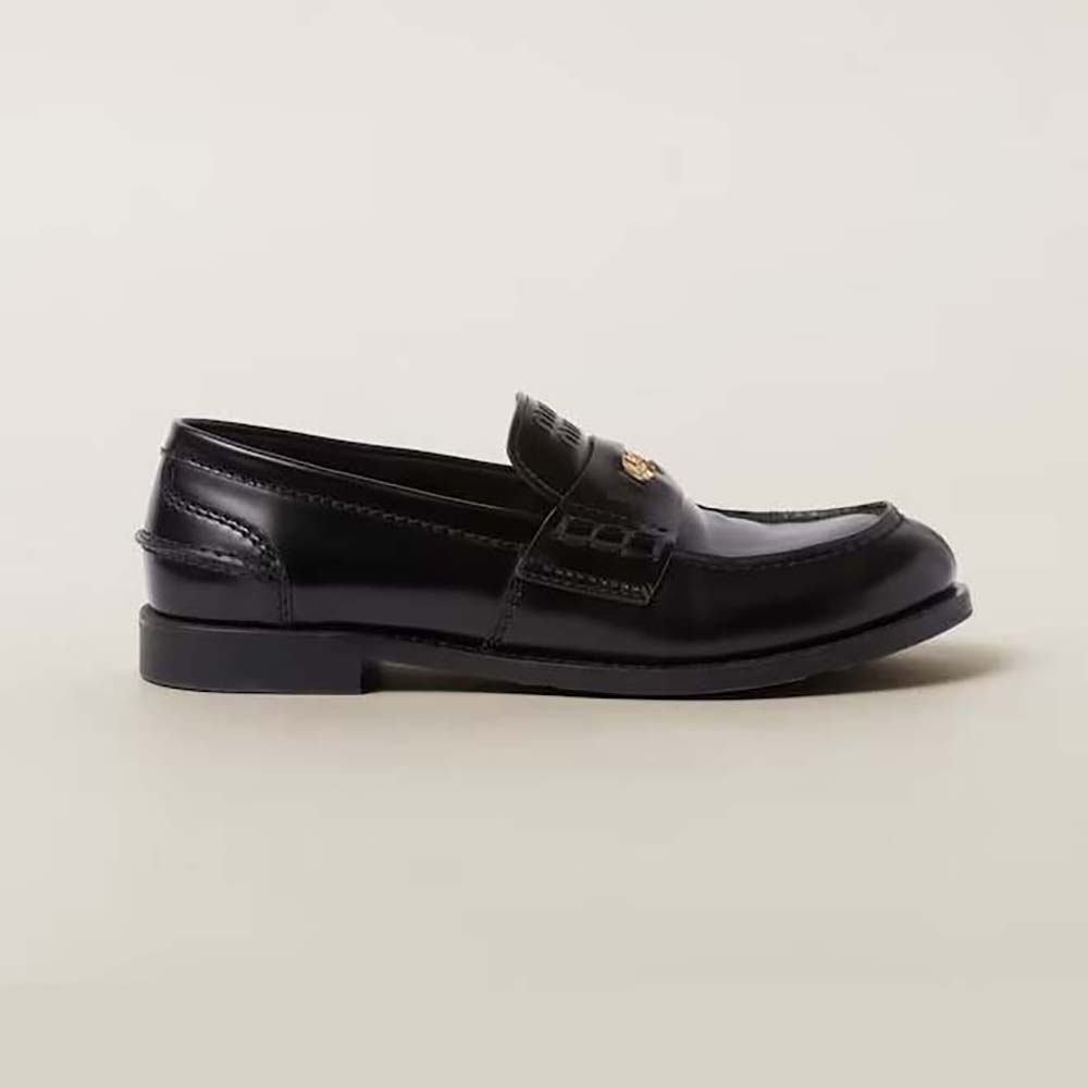 Side view of Miu Miu Women Brushed Leather Loafers-Black showing silhouette