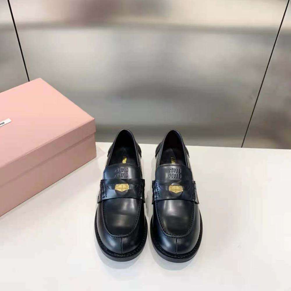 Close-up of brushed leather texture on Miu Miu Women Brushed Leather Loafers-Black