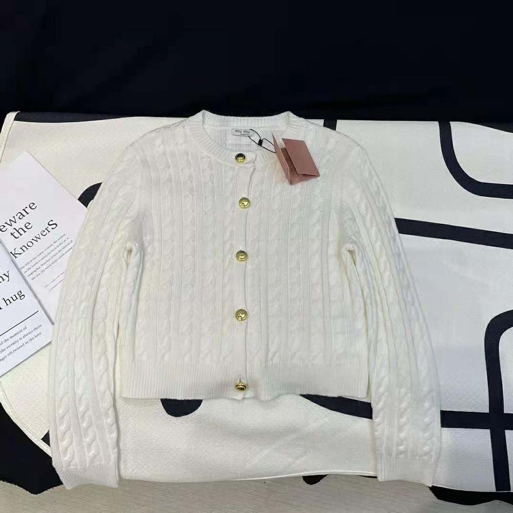 Close-up detail of knit logo patch on Miu Miu Women Cashmere Cardigan