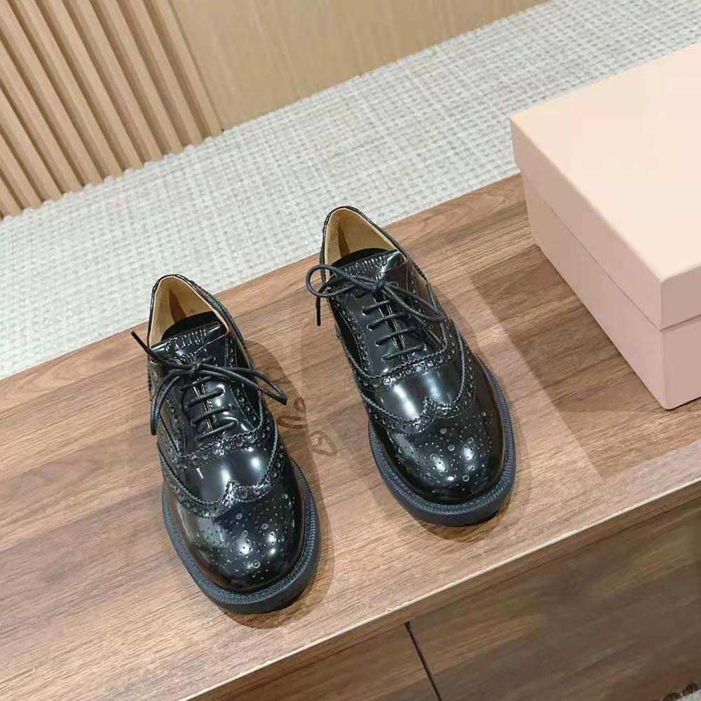 Close-up of perforated brogue detailing on Miu Miu Women Church’s X Miu Miu Shoes