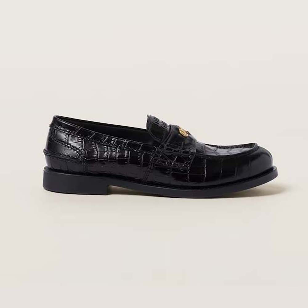 Side angle of Miu Miu Women Croco-print Leather Penny Loafers showing silhouette