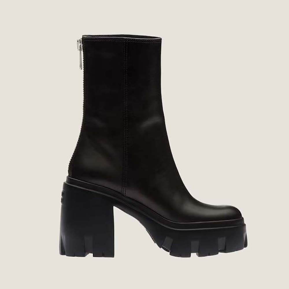 Side view of Miu Miu Women Leather Booties in EVA Sole with Logo-Black
