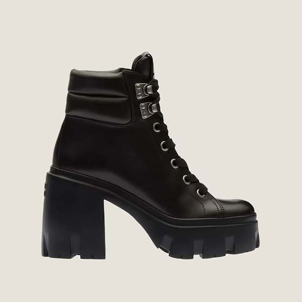 Side profile of Miu Miu Women Leather Booties with EVA Sole with Logo-Black