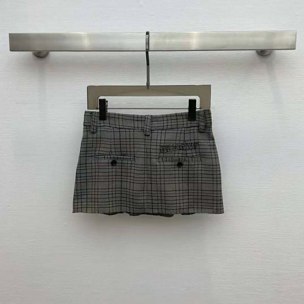 Side zip and silhouette of Miu Miu Women Prince of Wales Check Miniskirt