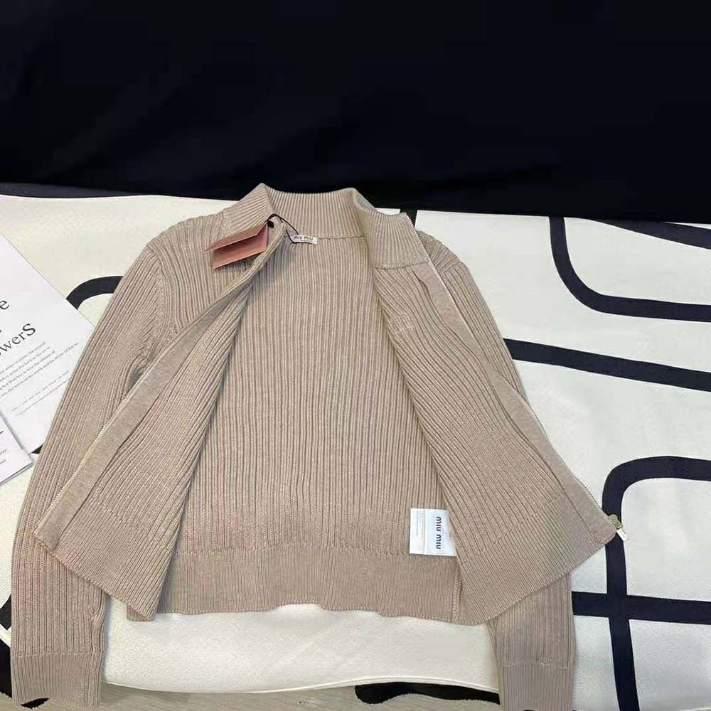 Side profile showing button closure on Miu Miu Women Wool Knit Cardigan
