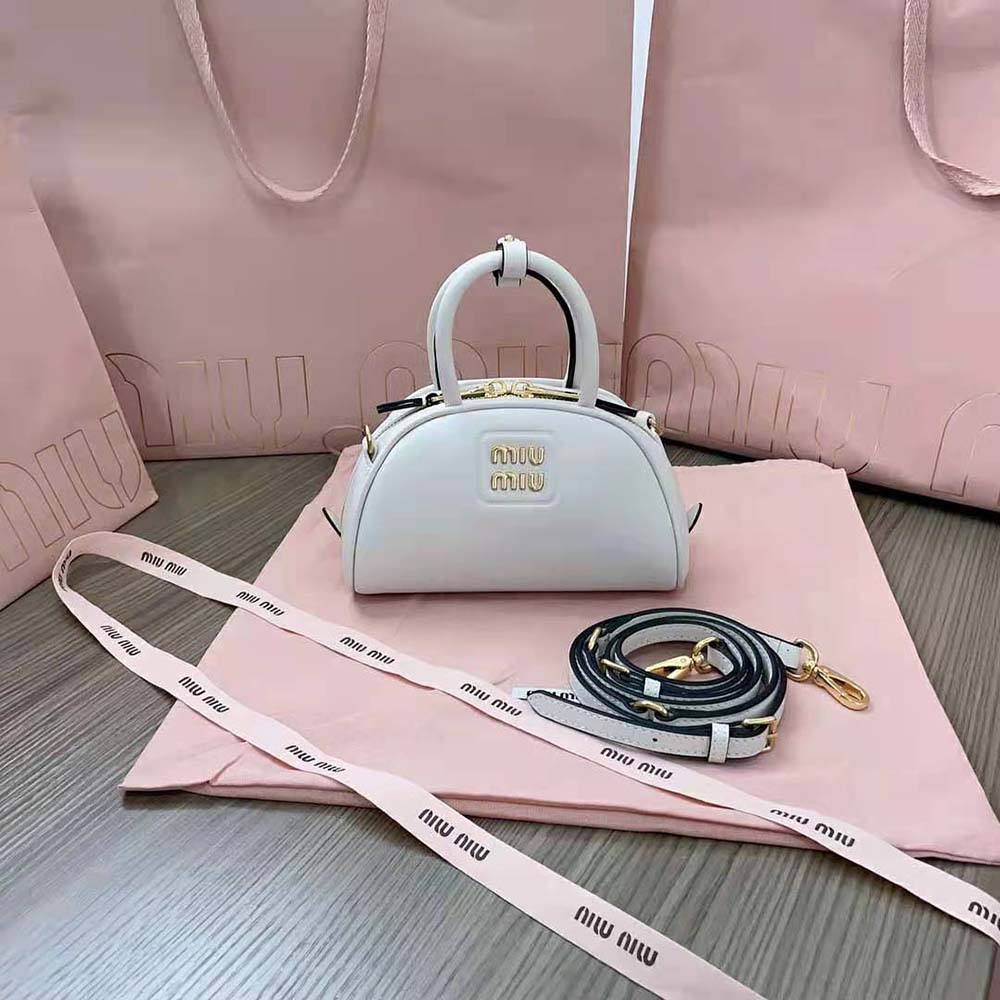 Close-up of silver hardware on Miu Miu Women Mini Leather Top-handle Bag-White