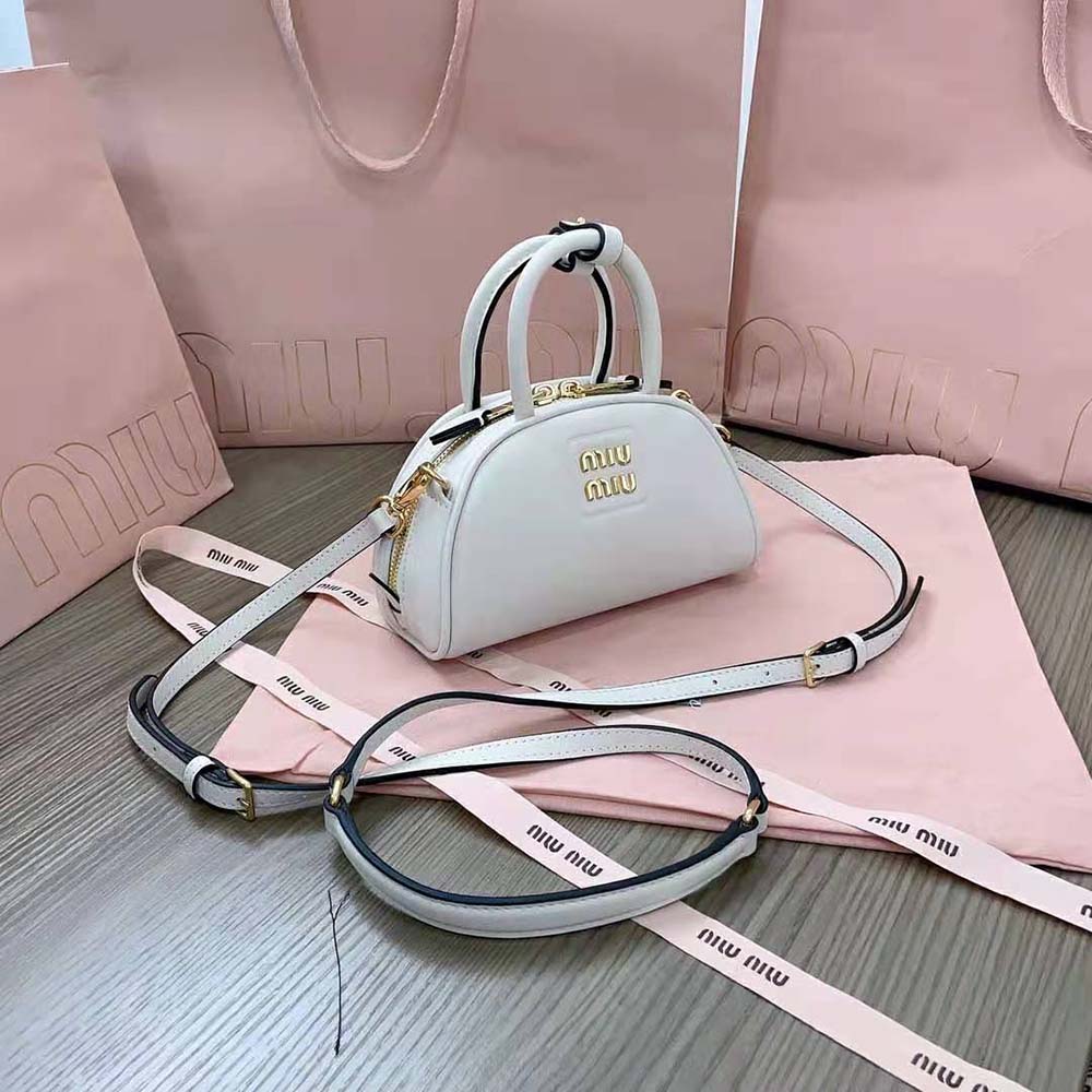 Side view showing structure of Miu Miu Women Mini Leather Top-handle Bag-White