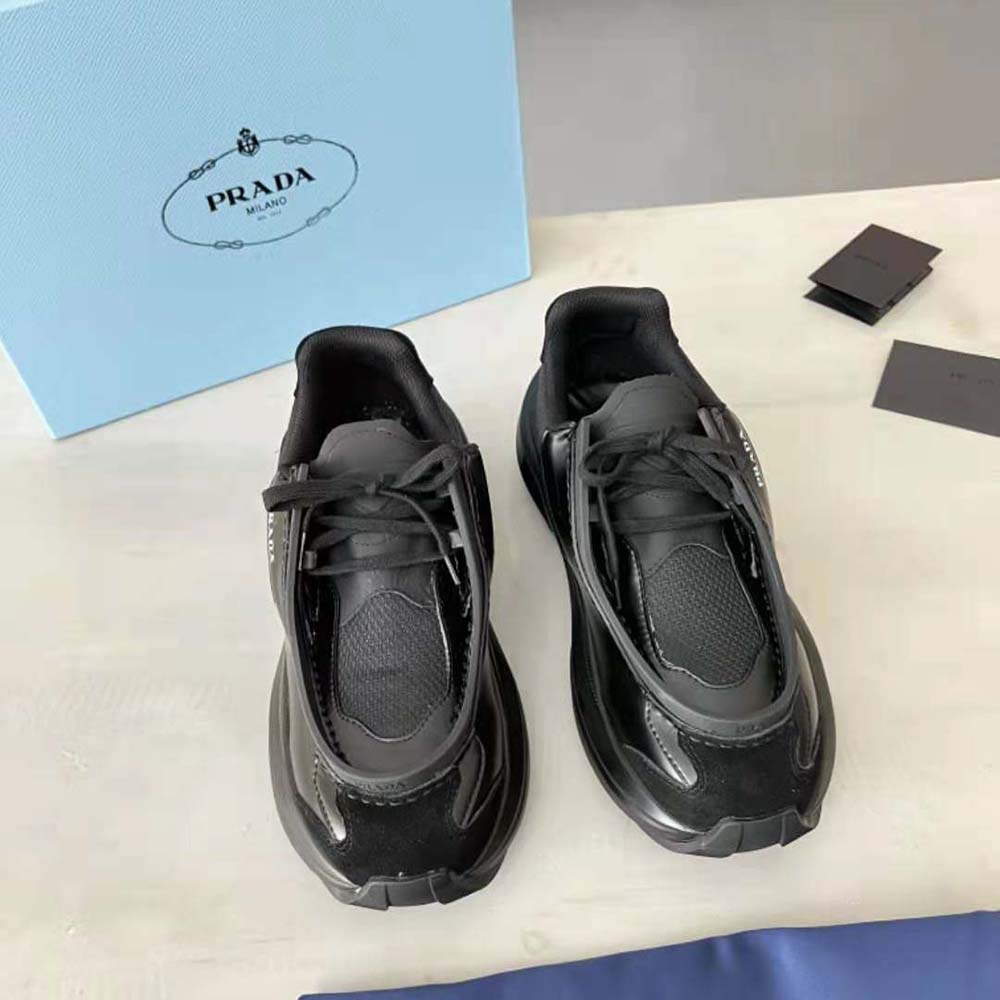 Close-up of brushed leather and bike fabric texture on Prada Men Sneakers black