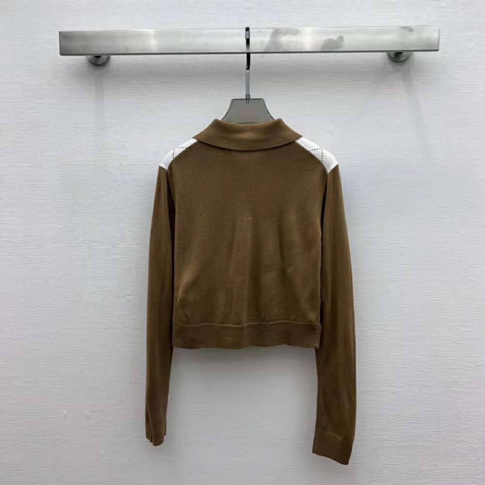 Side angle showing relaxed fit of Prada Women Cashmere Polo Shirt