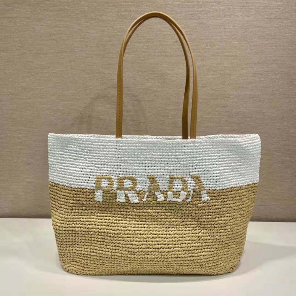 Side angle showing spacious silhouette of Prada Women Crochet and Leather Tote Bag