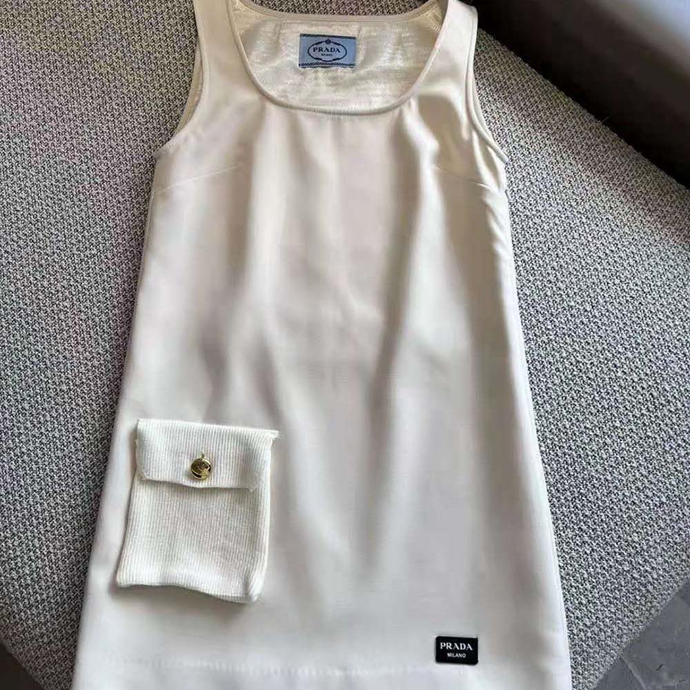 Close-up of leather logo label on Prada Women Natté Minidress White
