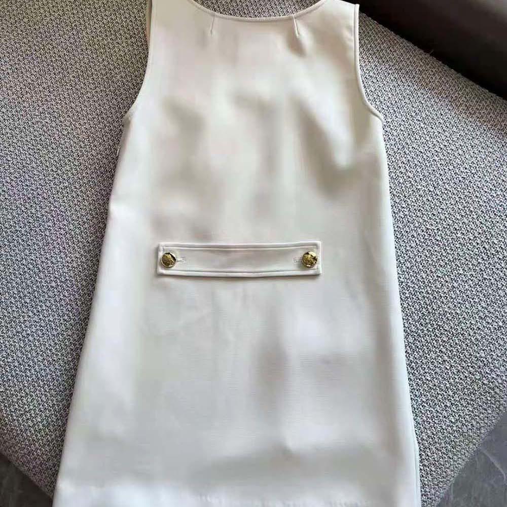 Side angle showing silhouette of Prada Women Natté Minidress in white