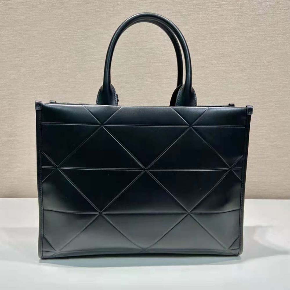Side angle showing compact silhouette of Prada Women Small Leather Prada Symbole Bag