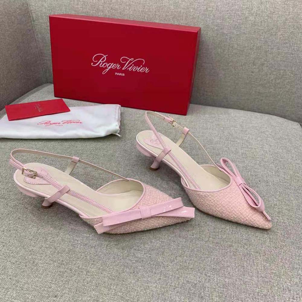 Rear angle showing adjustable slingback strap on Roger Vivier pink pumps