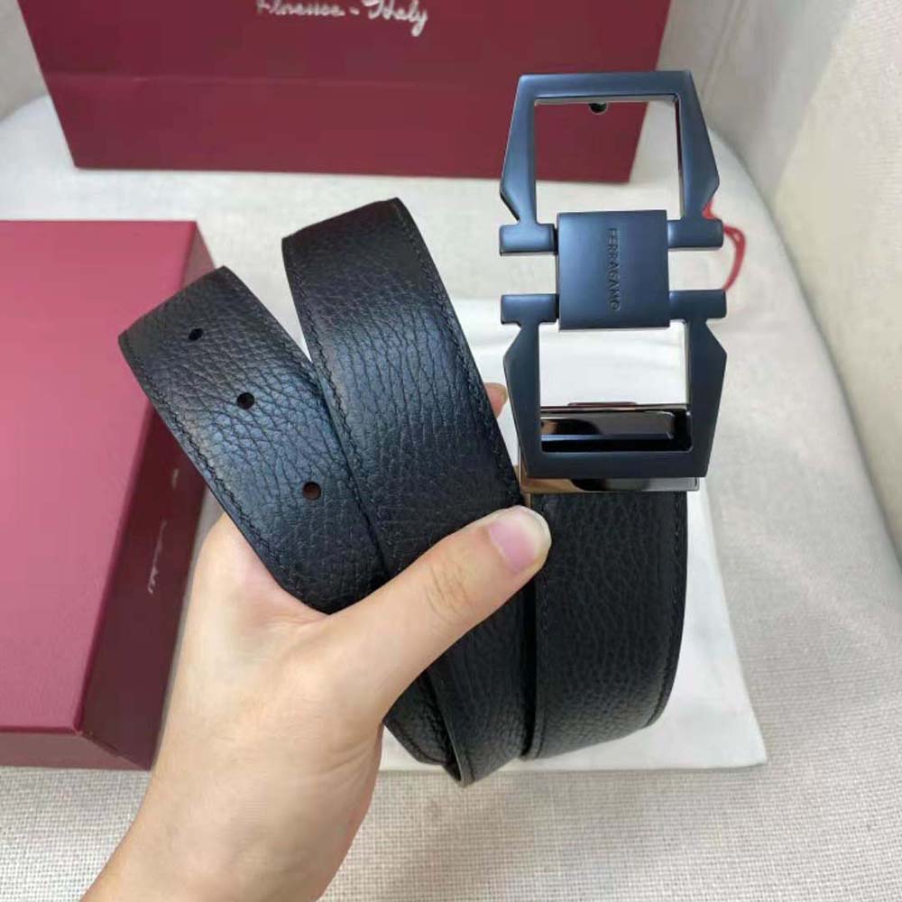 Side angle showing reversible black leather on Salvatore Ferragamo Gancini Belt
