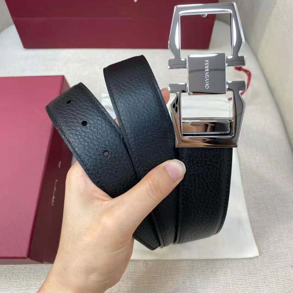 Close-up of polished silver Gancini hardware on Salvatore Ferragamo Men Reversible and Adjustable Gancini Belt-Silver
