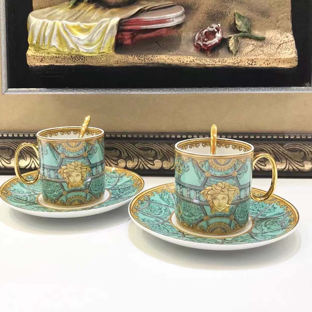 Side angle showing glossy ceramic finish of Versace Scala Del Palazzo Verde Mug-Blue