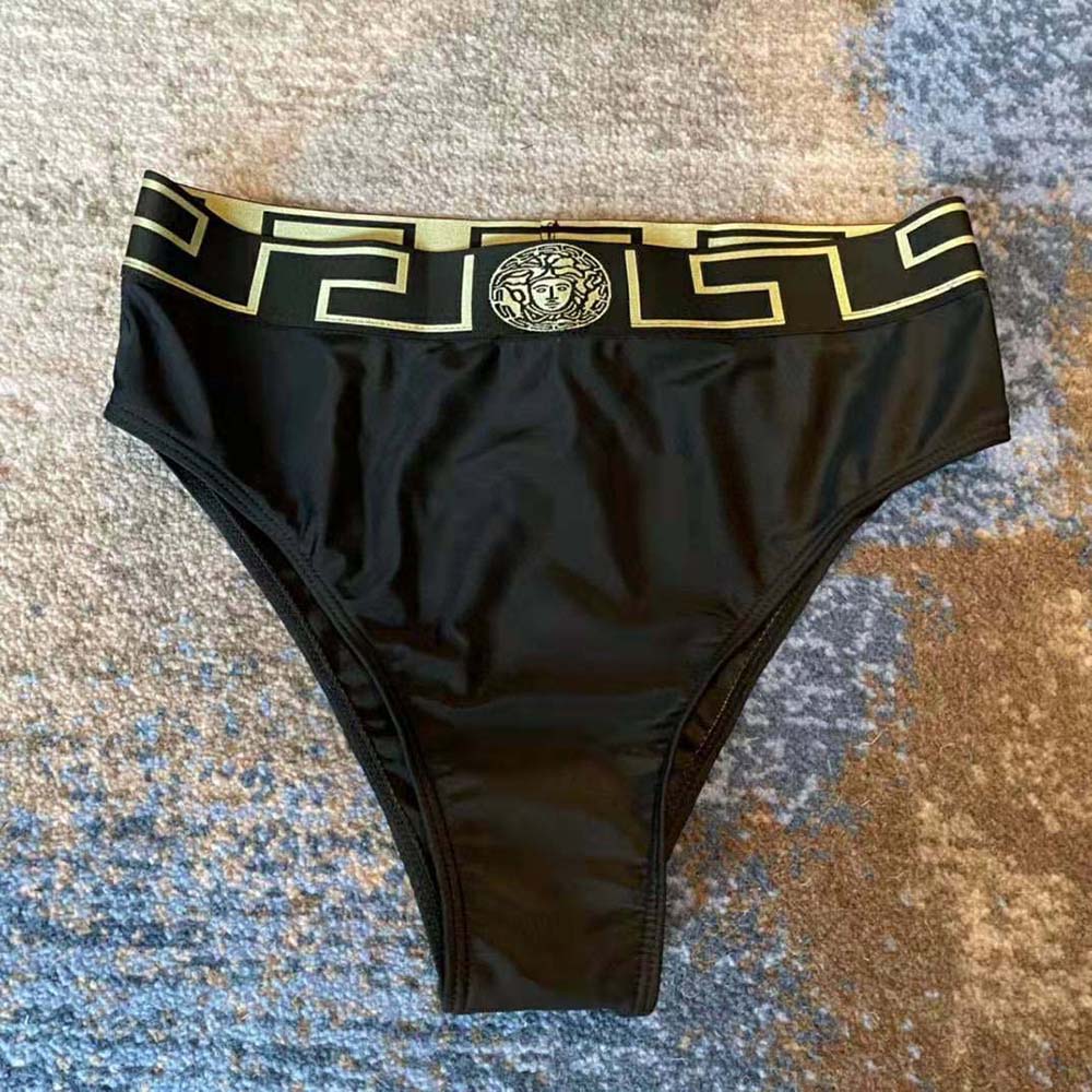 Close-up of signature gold Greca border on Versace Women briefs