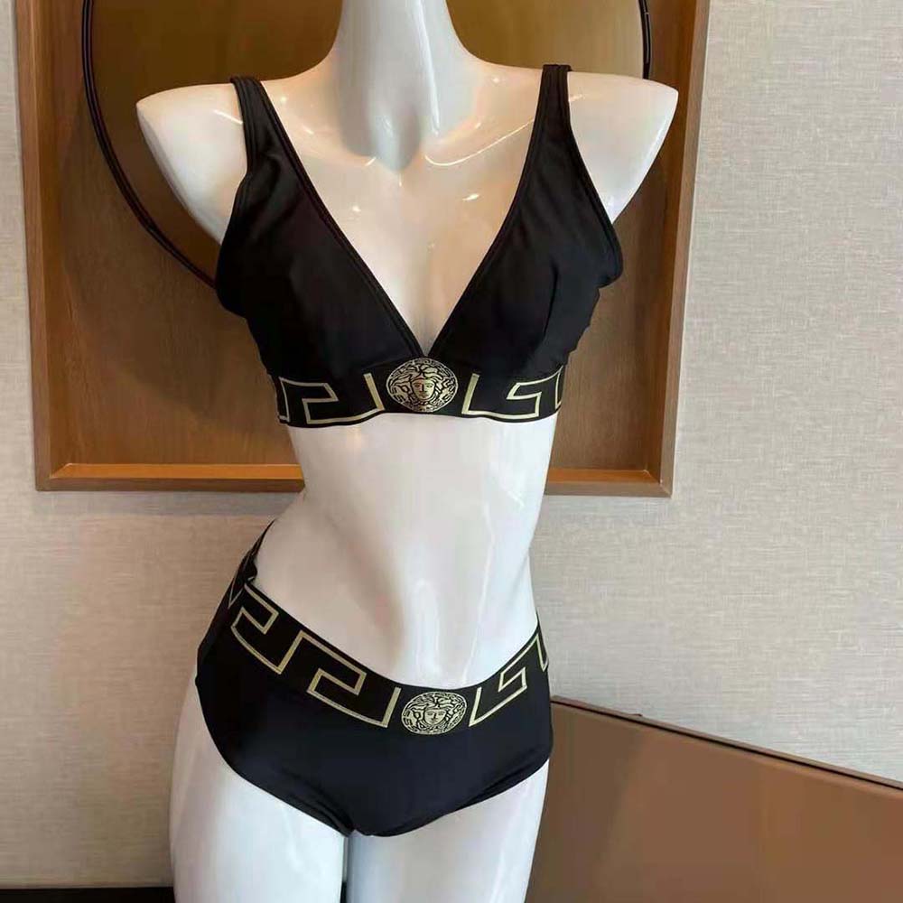 Close-up of Greca border and gold-tone hardware on Versace bralette