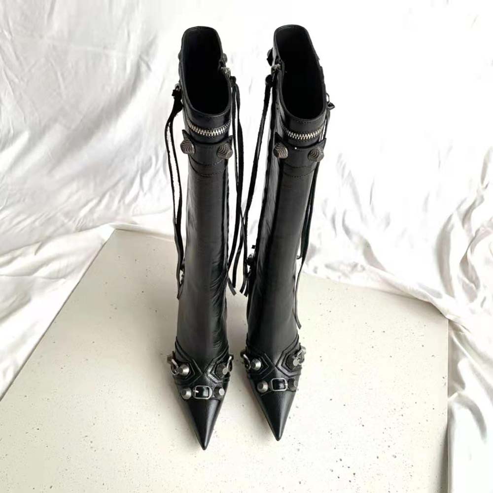 Close-up of zipper and engraved hardware on Balenciaga Cagole boot