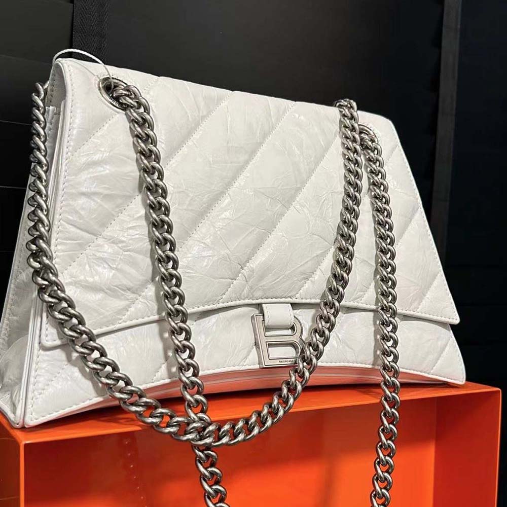 Side angle showing medium size and shoulder strap of Balenciaga bag