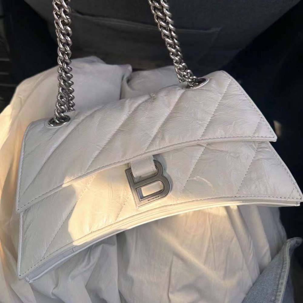 Side angle showing silhouette and strap detail on Balenciaga Women Crush XS Bag