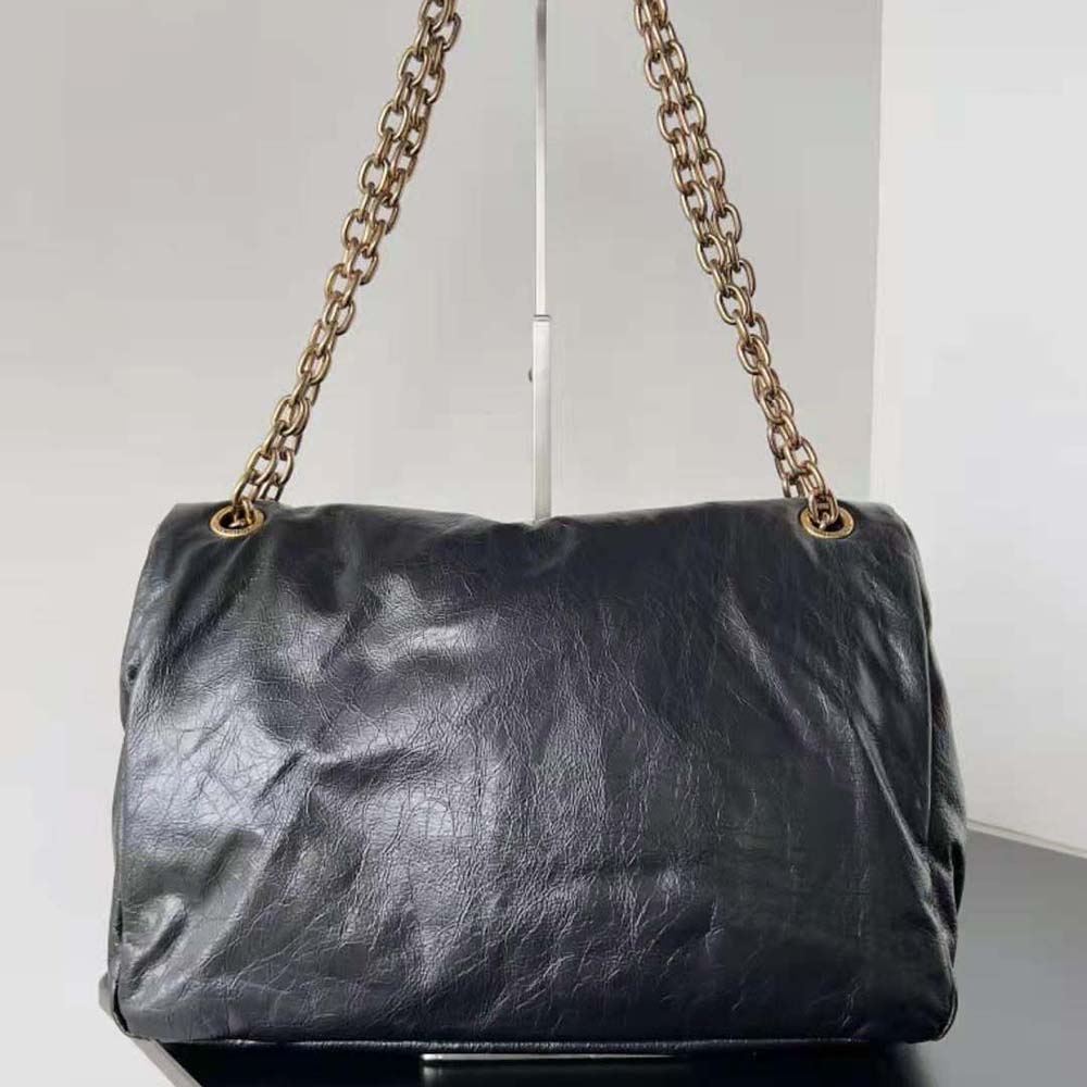Side angle showing silhouette of Balenciaga Women Monaco Medium Chain Bag