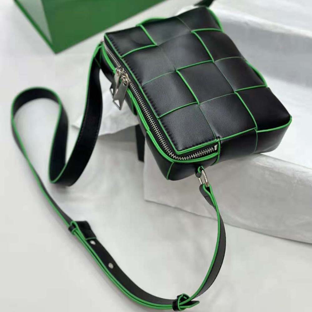 Side angle showing silver hardware on Bottega Veneta Men Cassette Camera Bag