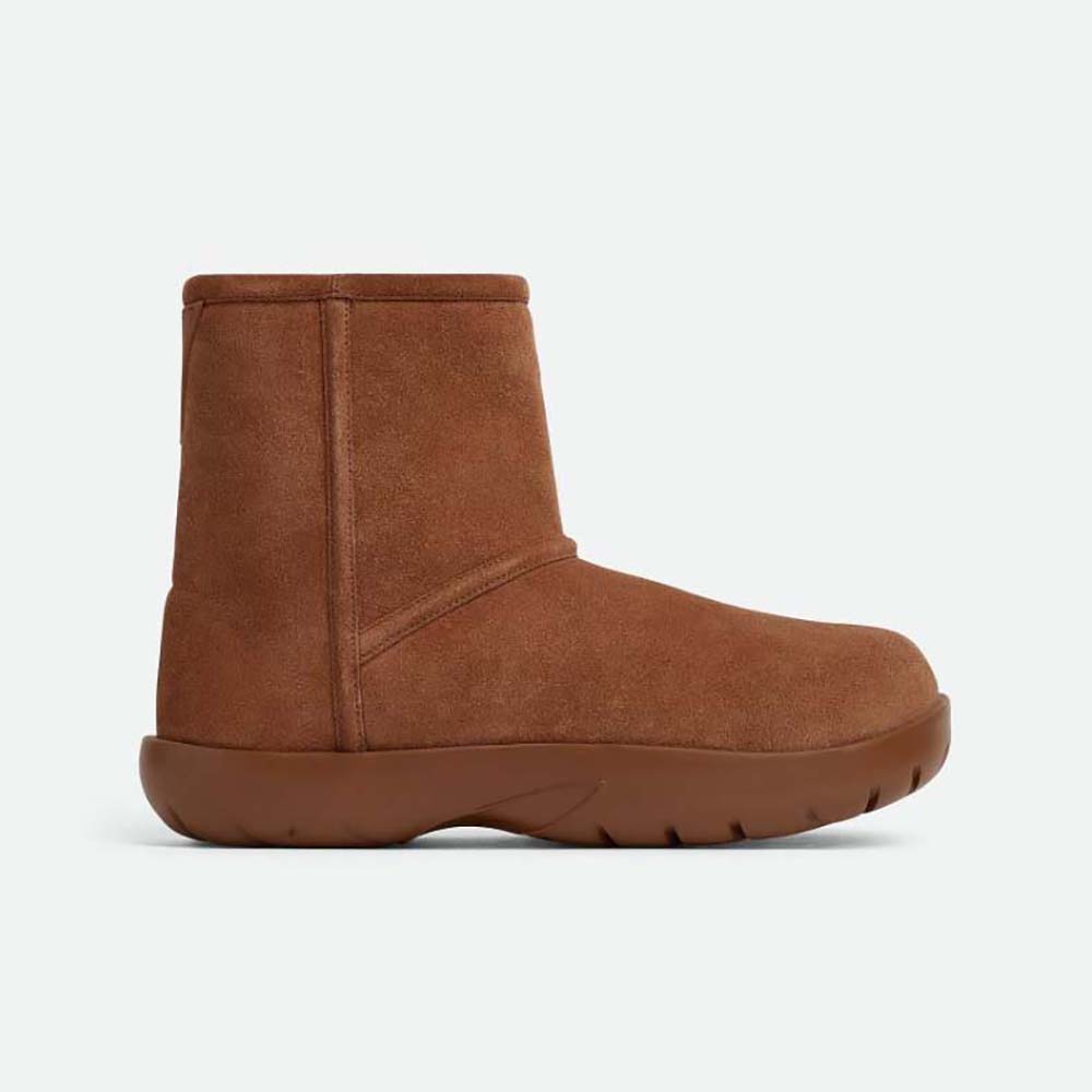 Side profile of Bottega Veneta Unisex Snap Ankle Boot in brown shearling calfskin