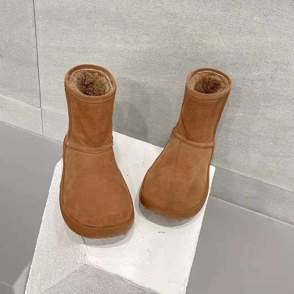 Top-down view showing texture and silhouette of Bottega Veneta shearling calfskin boot
