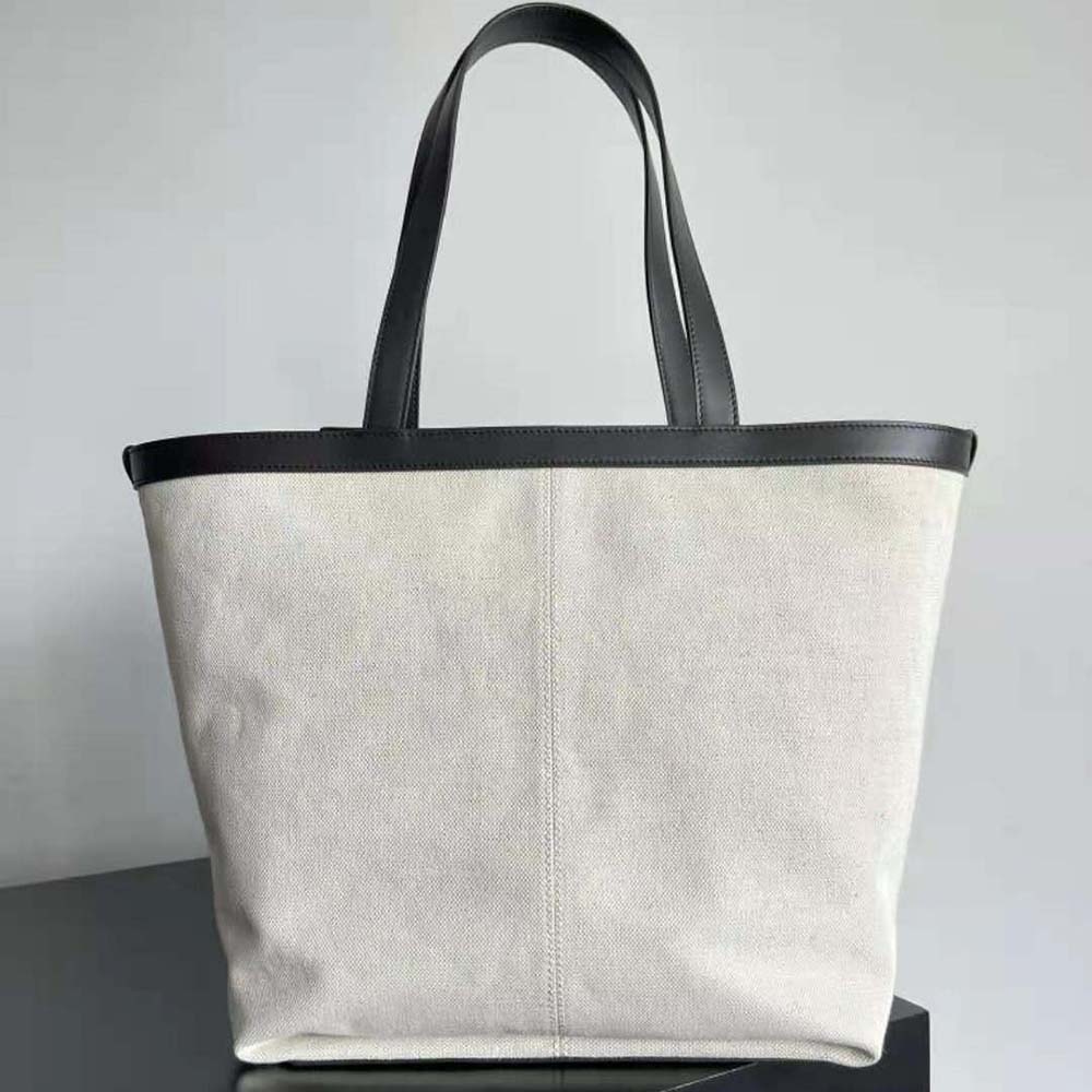 Side angle showing the structured silhouette of Bottega Veneta handbag