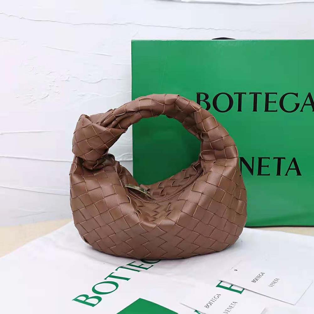 Close-up detail of woven leather on Bottega Veneta Mini Jodie brown handbag