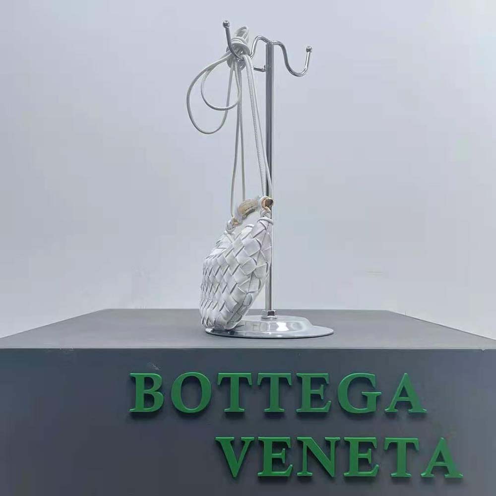 Side profile showing gold hardware detail on Bottega Veneta Mini Sardine bag