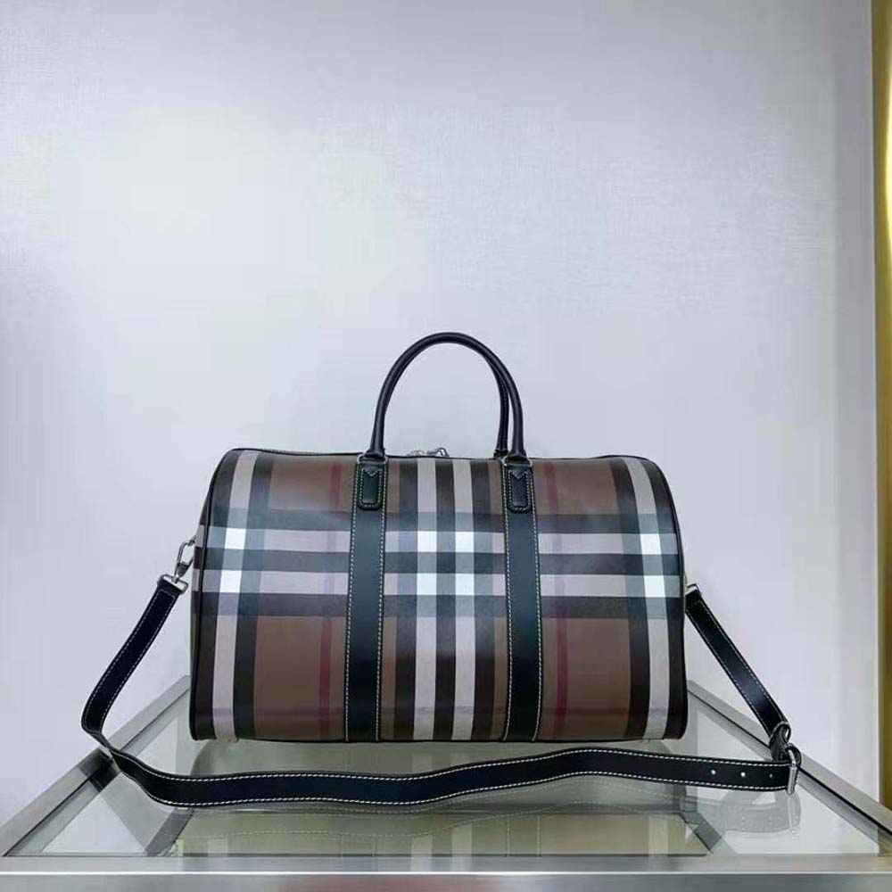 Side profile showing spacious silhouette of Burberry Men Boston Holdall-Brown