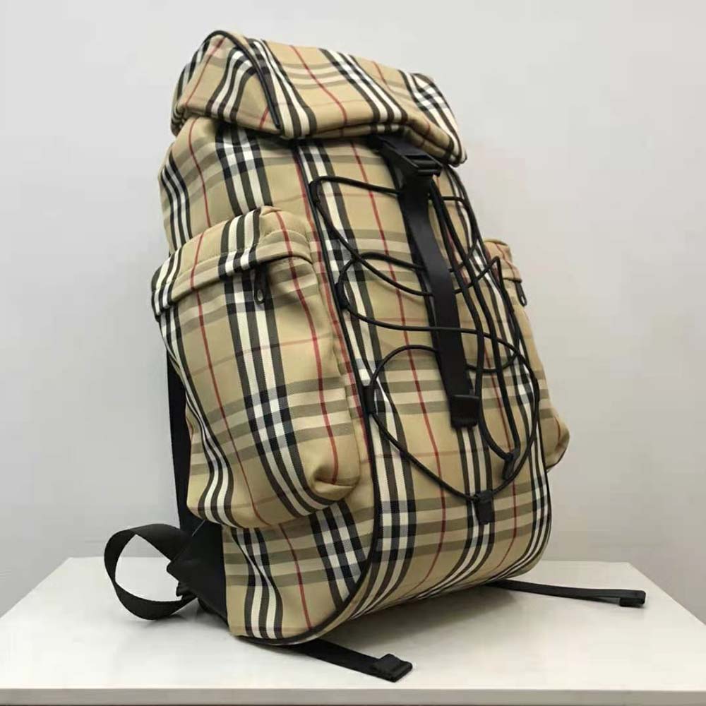 Side angle highlighting brushed gold hardware on Murray Backpack-Brown