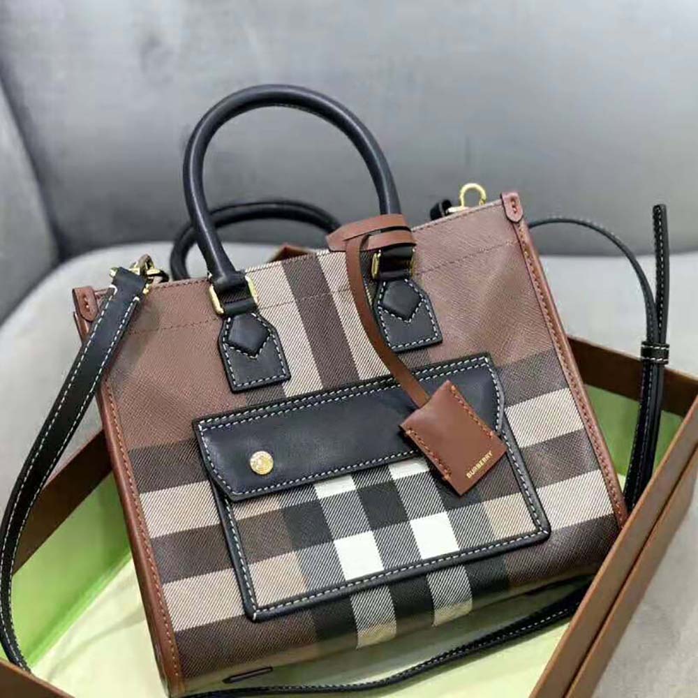 Close-up of gold-tone hardware on Burberry Women Mini Freya Tote-Brown