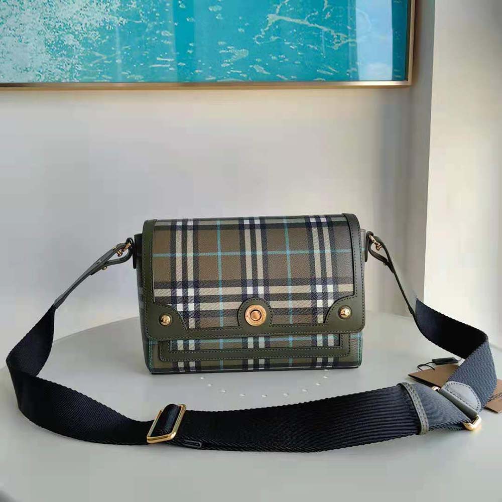 Side angle highlighting smooth leather texture on Burberry Women Note Bag-Green