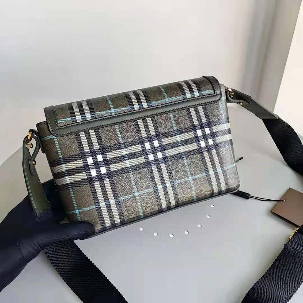 Close-up of signature gold hardware on Burberry Women Note Bag-Green