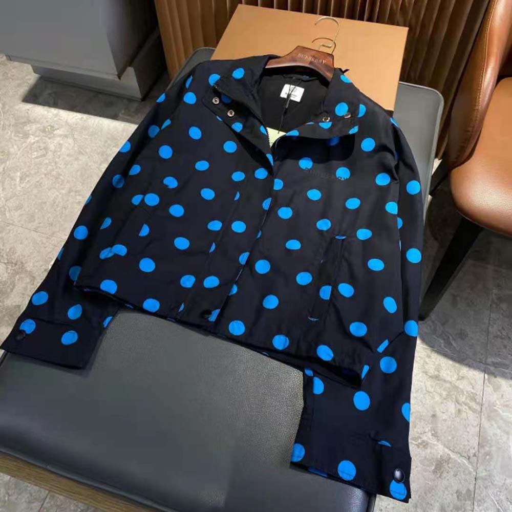 Detail of funnel neck and branded zipper on Burberry Polka Dot Jacket