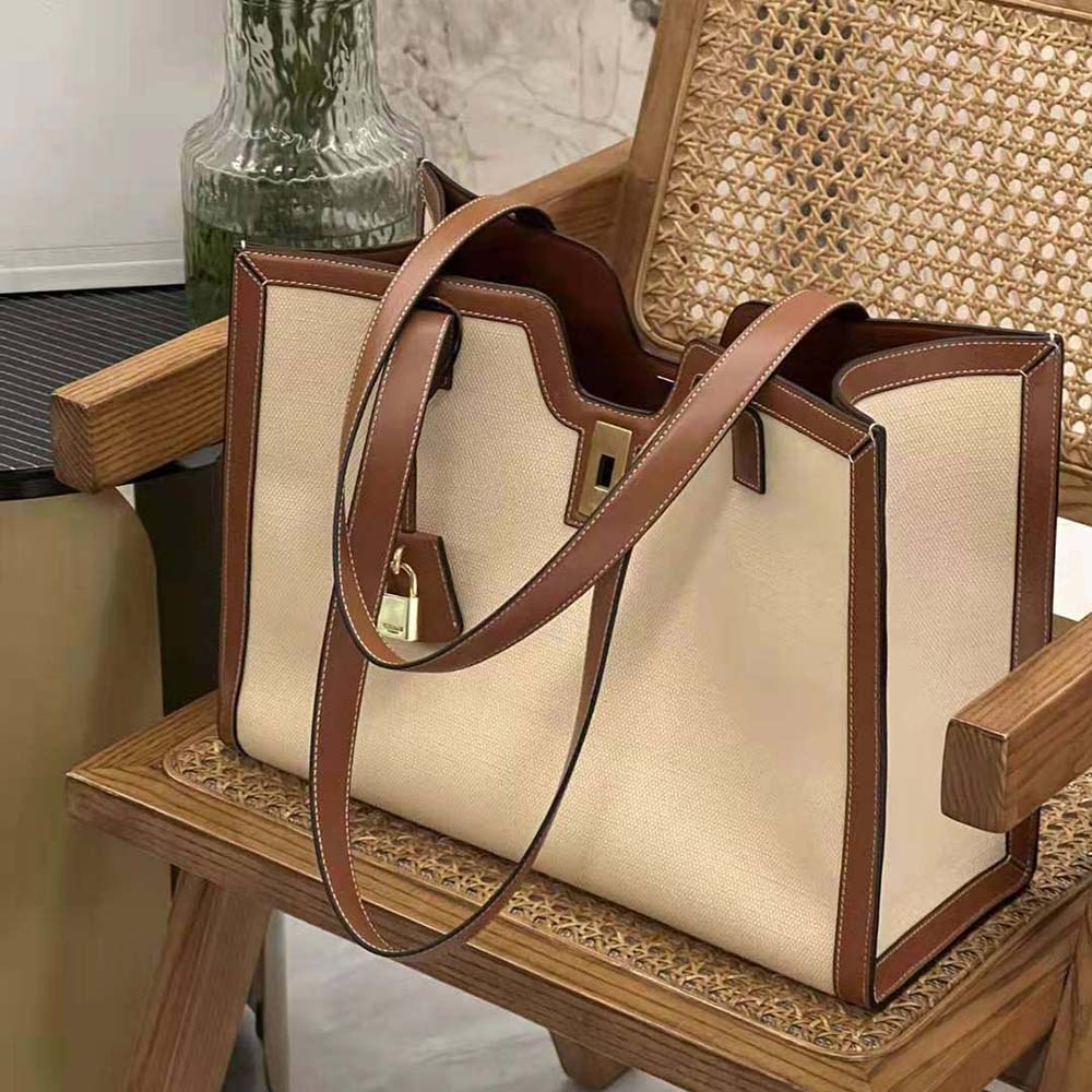 Side angle showing spacious silhouette of Celine Women Cabas 16 bag