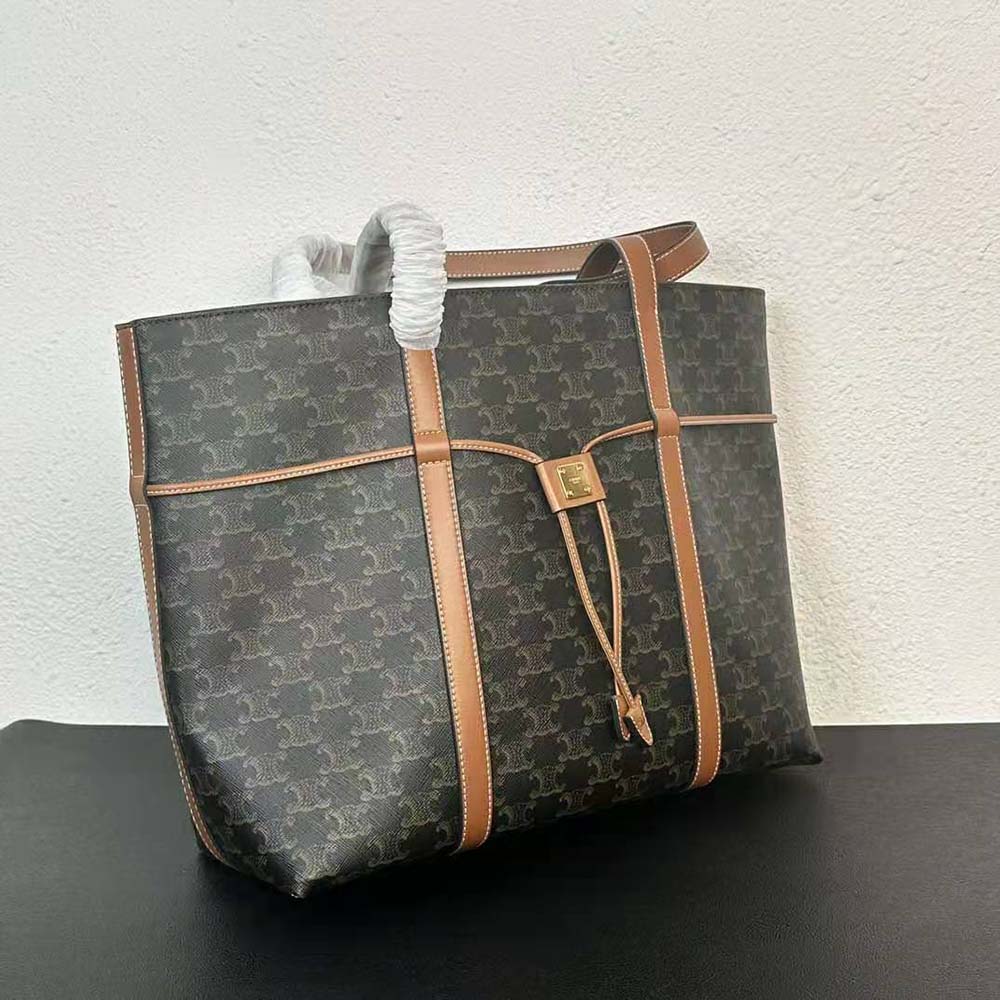 Side angle highlighting brown calfskin trim on Celine Women Cabas Drawstring