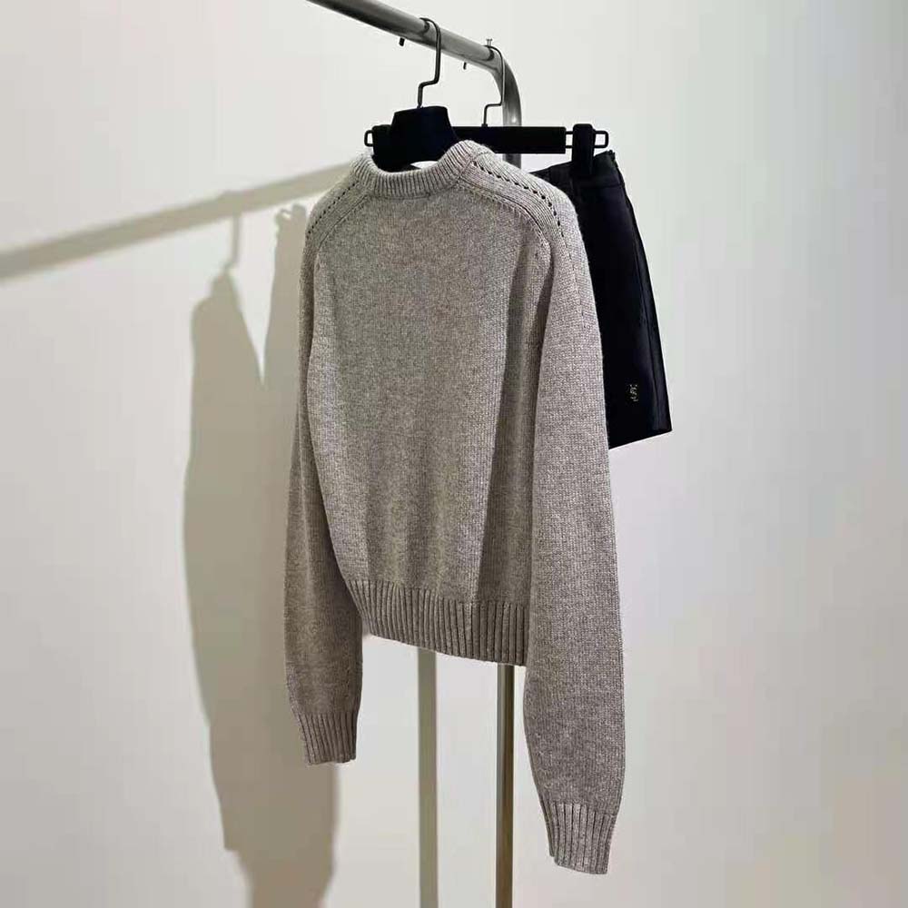 Side profile showing fit of Celine Women Crew Neck Sweater in brown