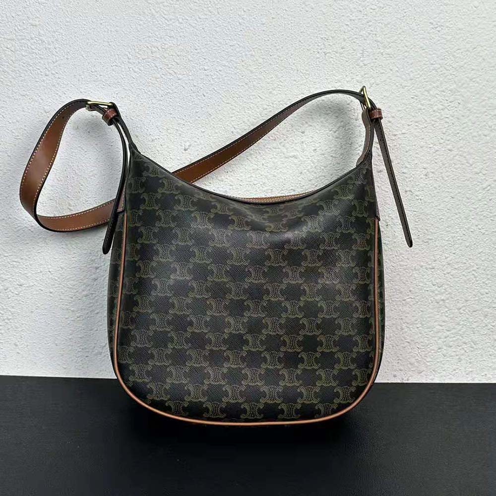 Close-up of magnetic flap and gold hardware on Celine Women Heloise Bag